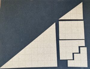 Five parts for a curry triangle lie slightly separated in order to make clear the decomposition. There is a 4-by- right triangle, a 9-by-7 right triangle, a 4-by-3 rectangle, a figure made of rows of 4, 3, and 2, and another of rows 1, 2, and 3.
