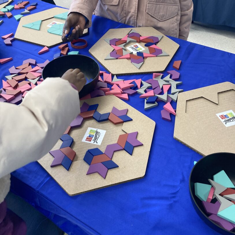 Children's hands fill geometric frames with colorful pattern blocks.