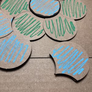 The central blue tile is surrounded by thinner green ones. We are zoomed in so that we can see that a space remaining to fill in the second (blue) ring is unfillable by the chosen tile.